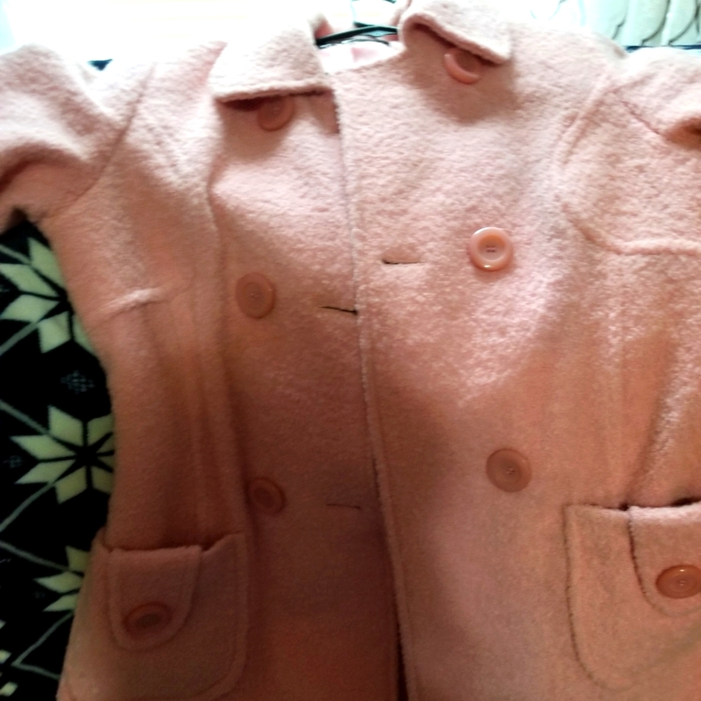 Adorable pink pea coat never worn without tags.
